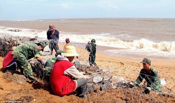 Hình ảnh Việt Nam phòng chống bão Haiyan trên báo nước ngoài 15