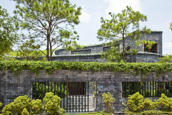 green home 6 Spectacular Torus Shaped Stone House With Sustainable Features in Vietnam