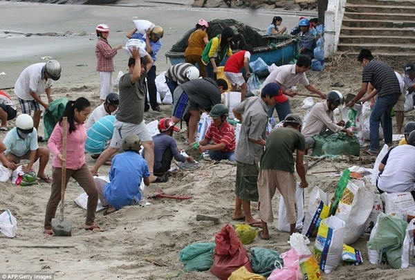 Hình ảnh Việt Nam phòng chống bão Haiyan trên báo nước ngoài 3